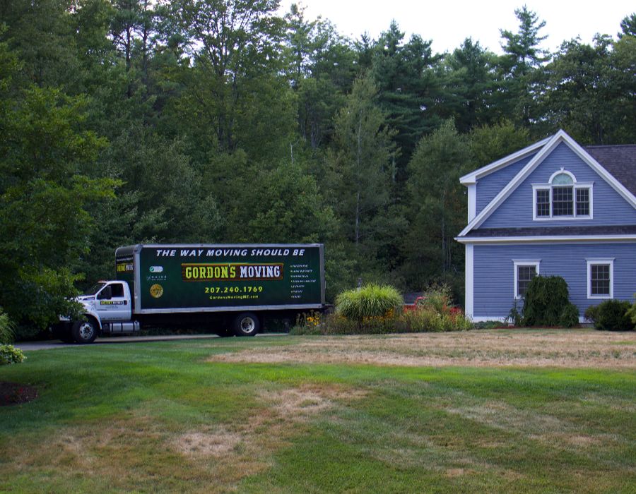 Moving truck near a house