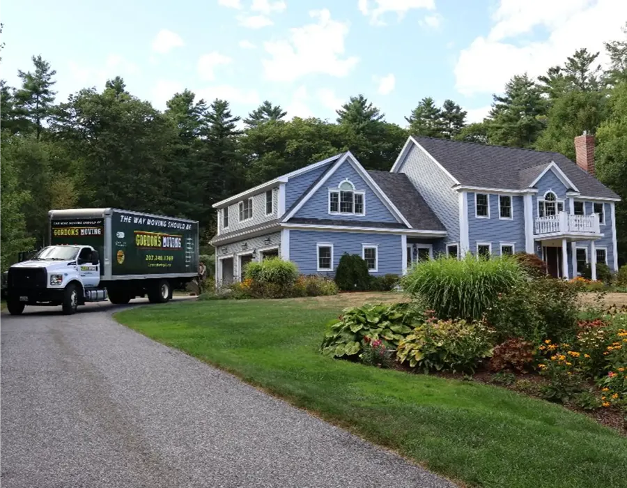 Moving truck at a suburban home